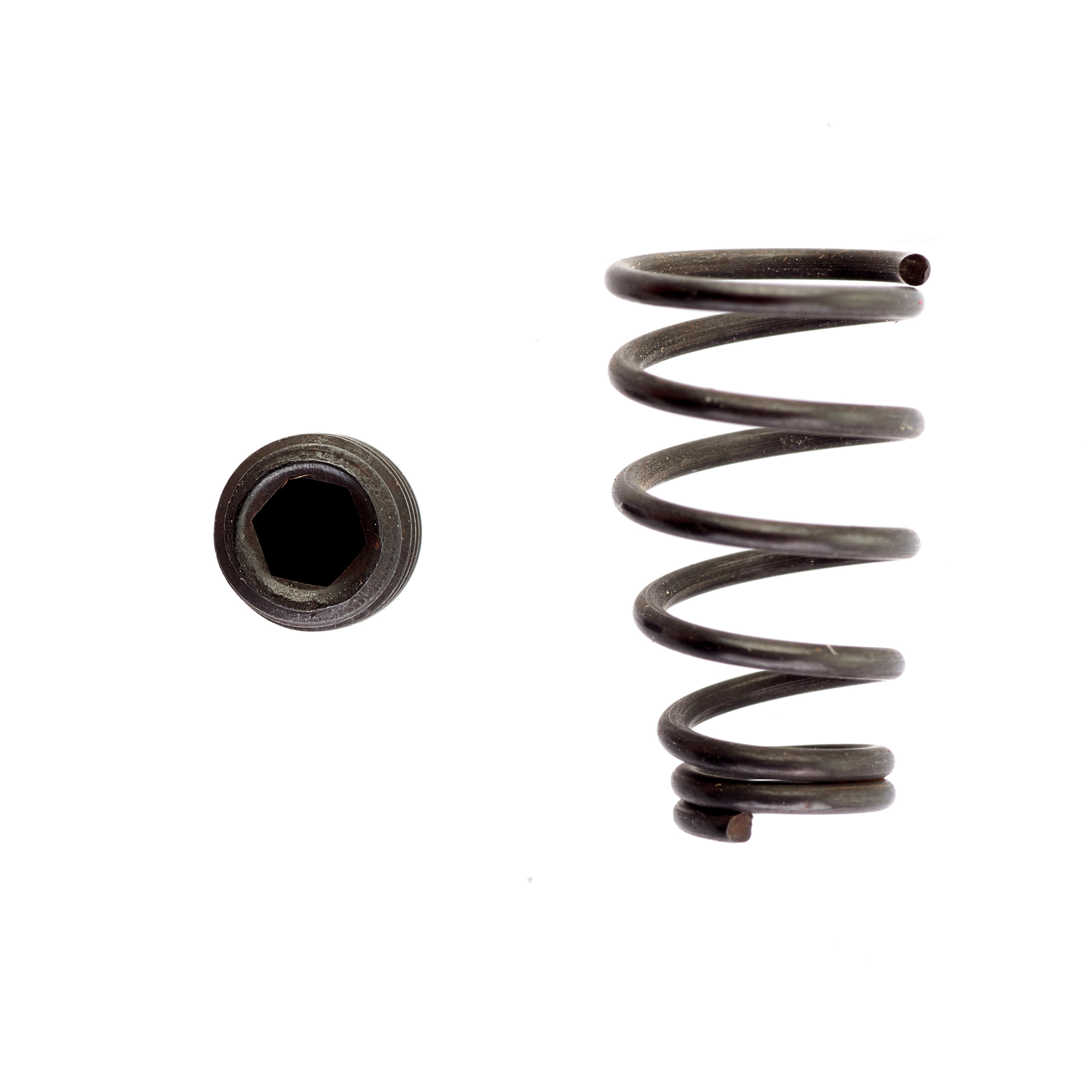 Muelle de eyección y tornillo fijador